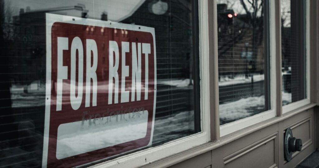 For lease sign in a storefront window, illustrating how to negotiate a commercial lease