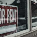 For lease sign in a storefront window, illustrating how to negotiate a commercial lease